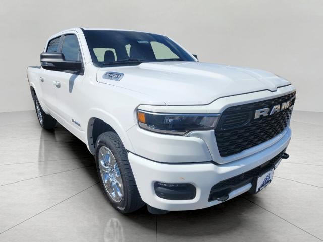 2025 RAM 1500 Big Horn Crew Cab 4x4 5'7" Box in Bright White Clearcoat — front three-quarter view